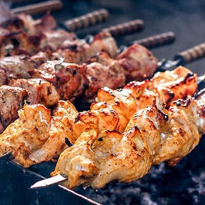 Petra Tampa – Grilled Chicken Kebab Juicy grilled chicken kebabs over open flame at Petra Tampa