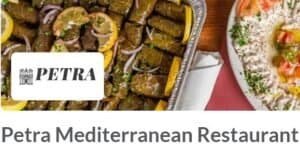 Petra Mediterranean Restaurant catering in Tampa featuring authentic Middle Eastern food like stuffed grape leaves and hummus platter