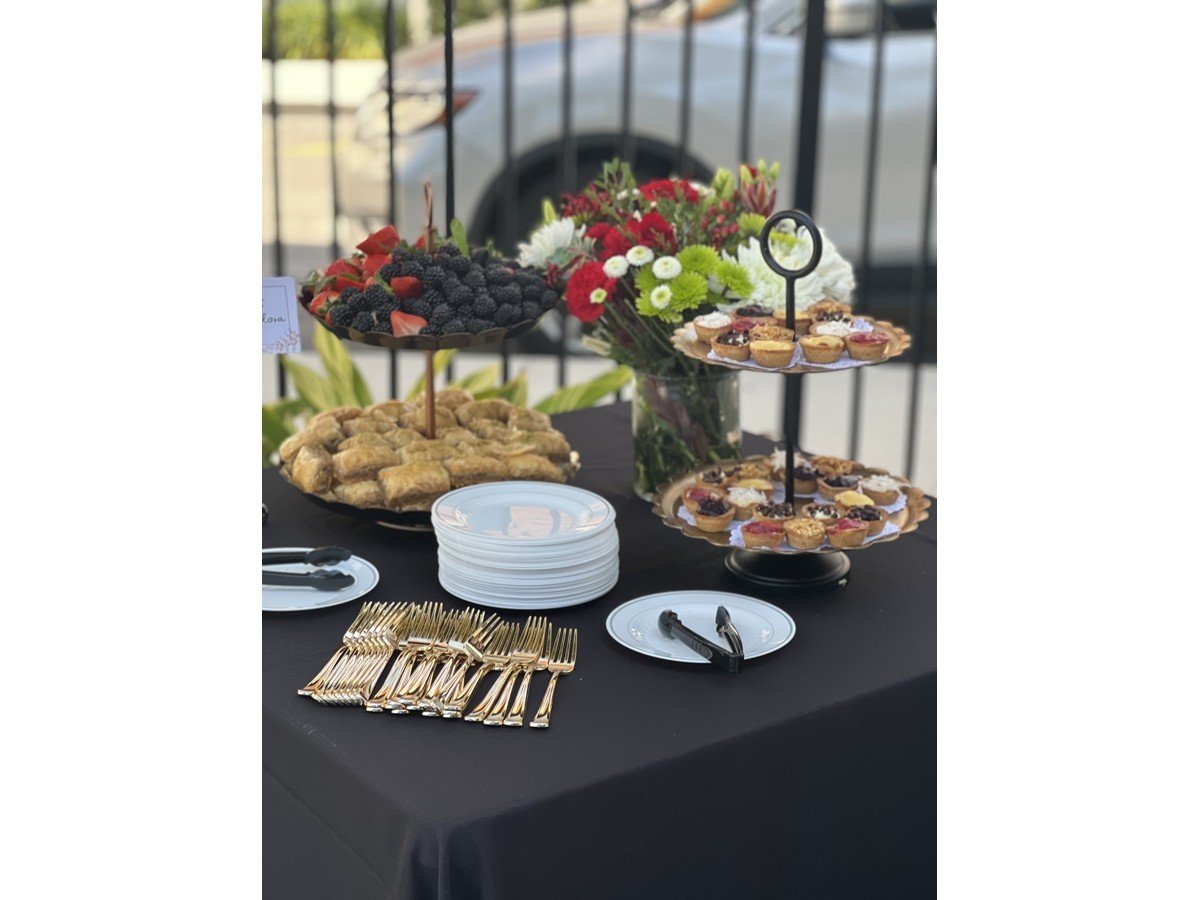 Fruit and dessert display for a catered event at Petra