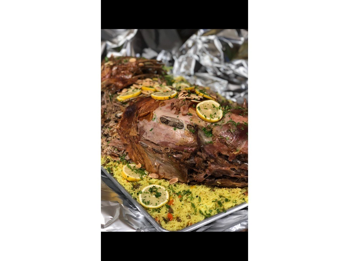 Whole lamb rice tray with mansaf and mandi at Petra Mediterranean Restaurant on Kennedy Blvd in Tampa