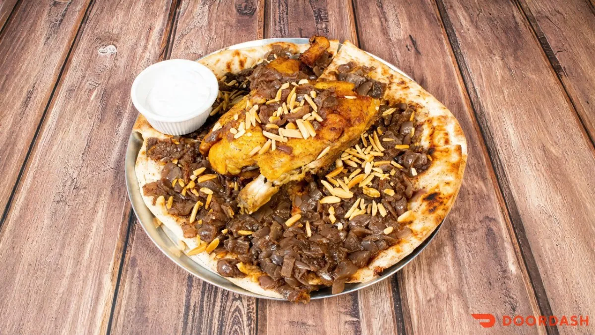Musakhan, roasted chicken with sumac and onions on flatbread