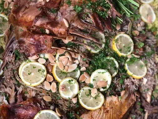 Roasted halal lamb catering platter at Petra Mediterranean Restaurant Kennedy Blvd Tampa FL