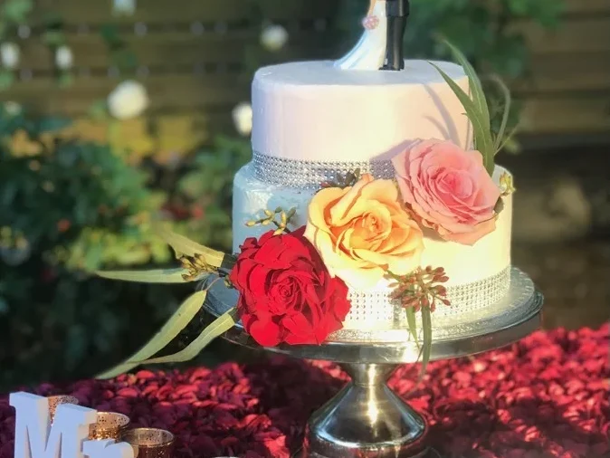 Wedding cake with fresh flowers at Petra Mediterranean Restaurant catering Tampa Kennedy Blvd